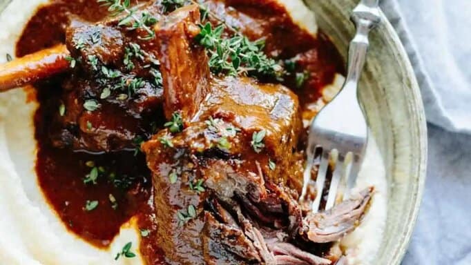 Red Wine Braised Short Ribs in a bowl with a fork.