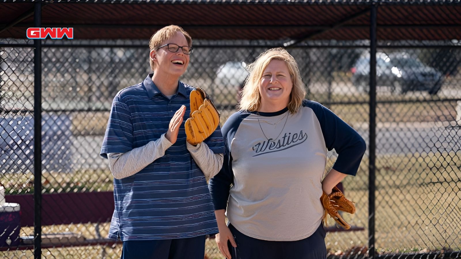 Jeff Hiller and Bridget Everett playing baseball in Somebody Somewhere