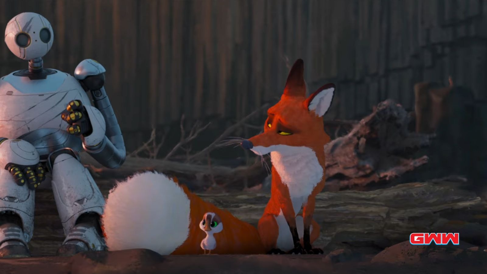 Roz and a fox relax together while a chick rests on the fox's tail.