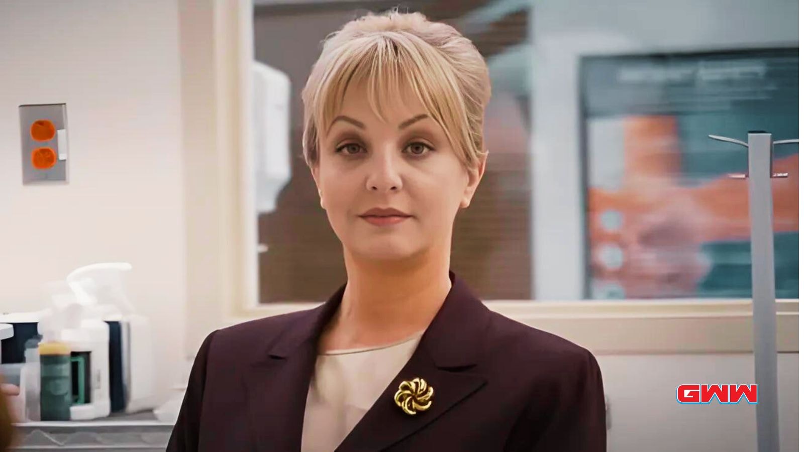 Dr. Lydia Harper stands confidently in hospital hallway