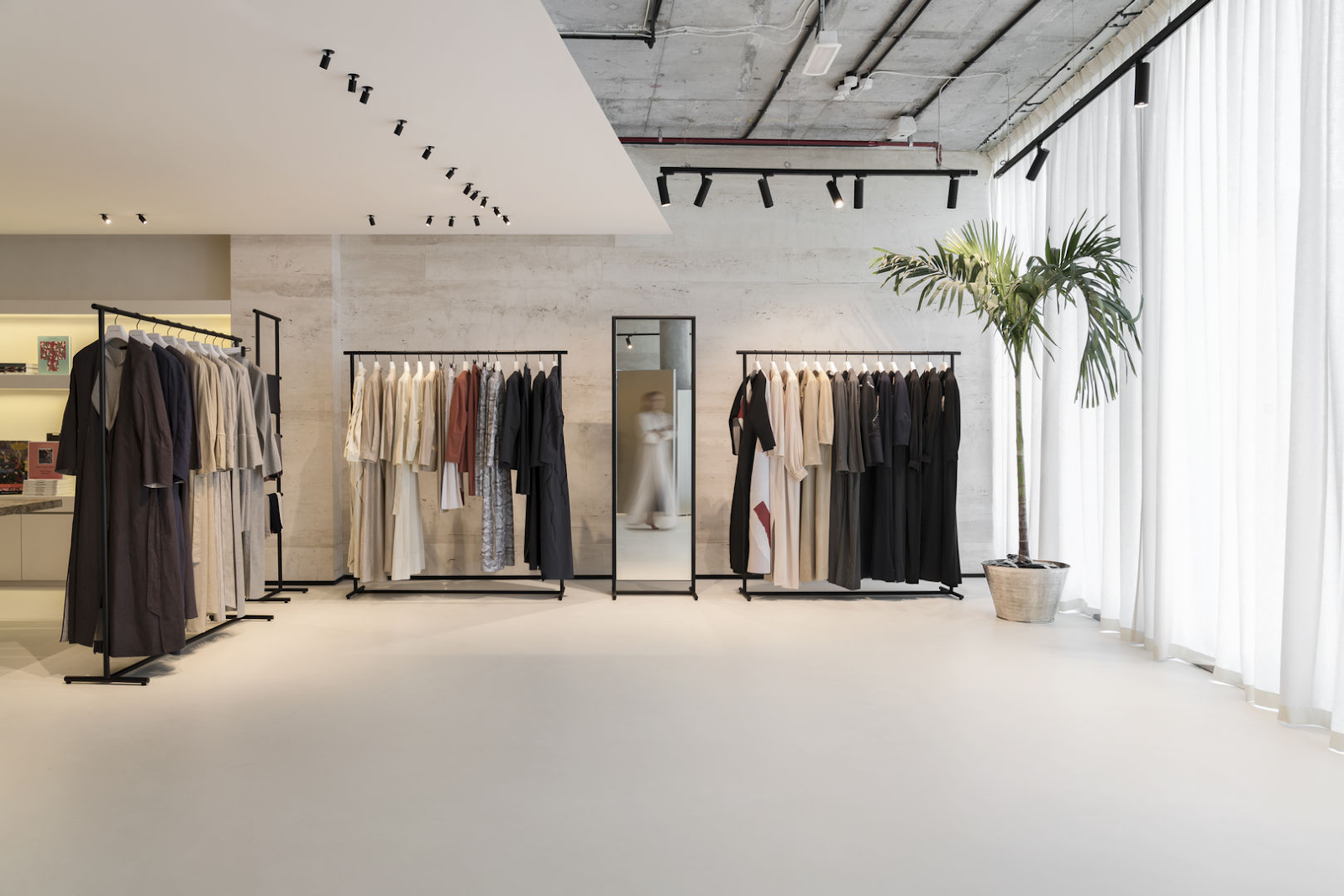 A minimalistic Abaya showroom in Saudi Arabia - (Credits Commercial Interior Design)