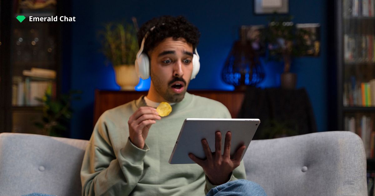 A man holding a tablet and looks shocked | Emerald Chat