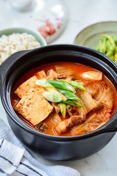 This contain an image of  Kimchi Jjigae
a korean most loved food