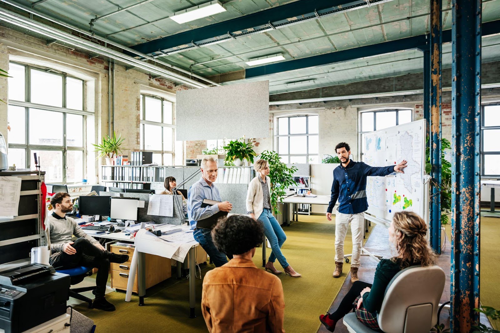 Person presenting to his team