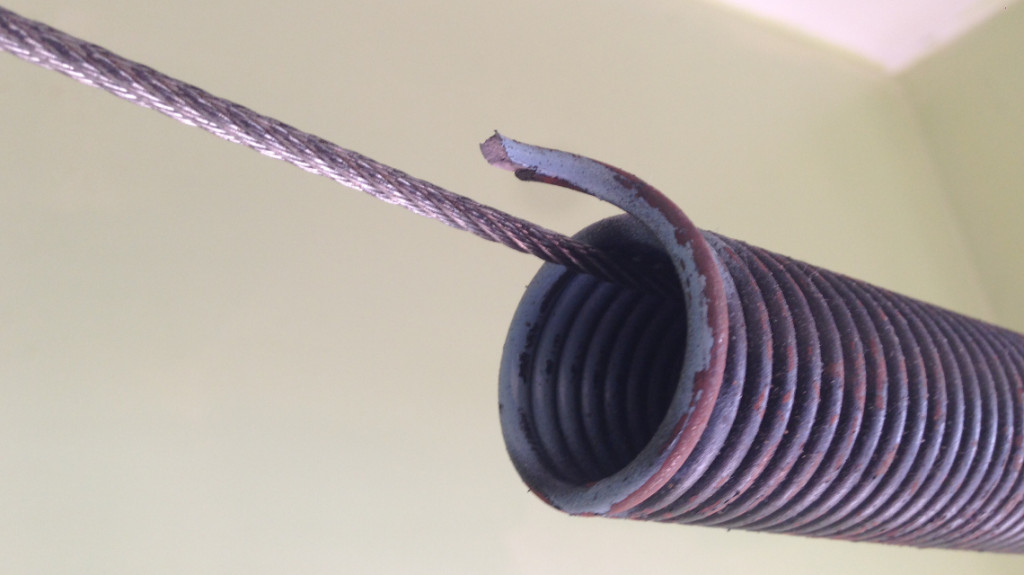 how to replace garage door spring