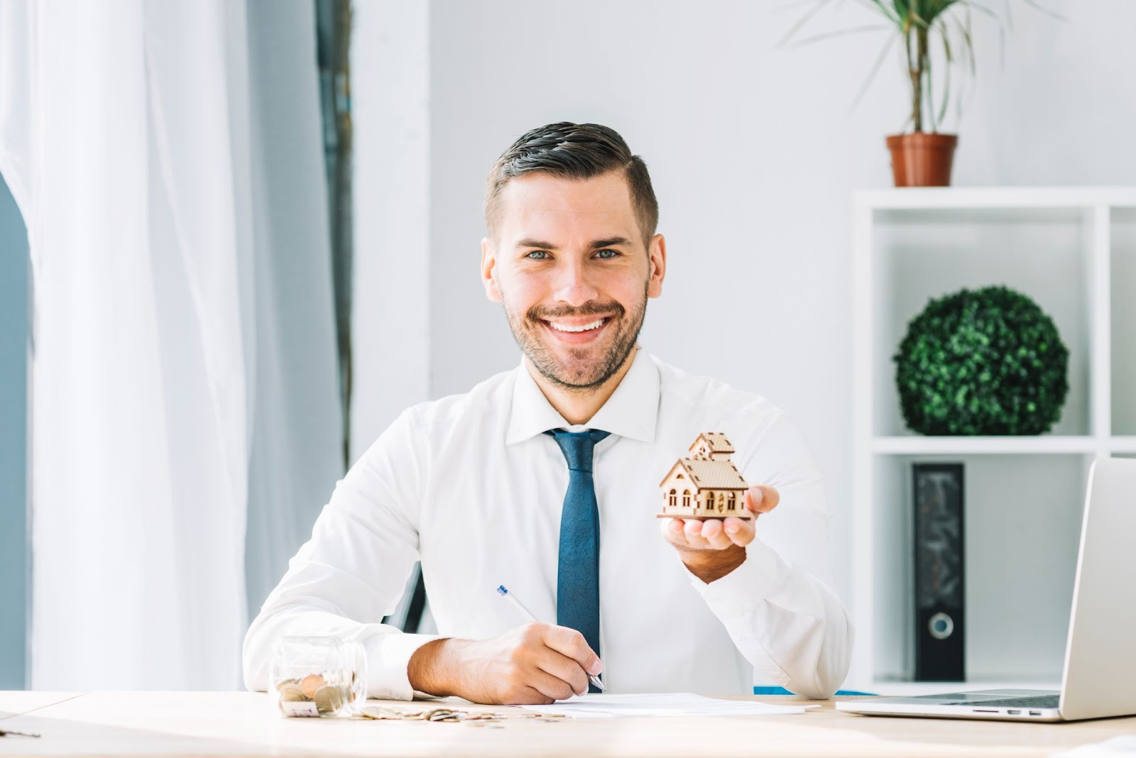 A man posing for his headshot against a minimalistic headshot background