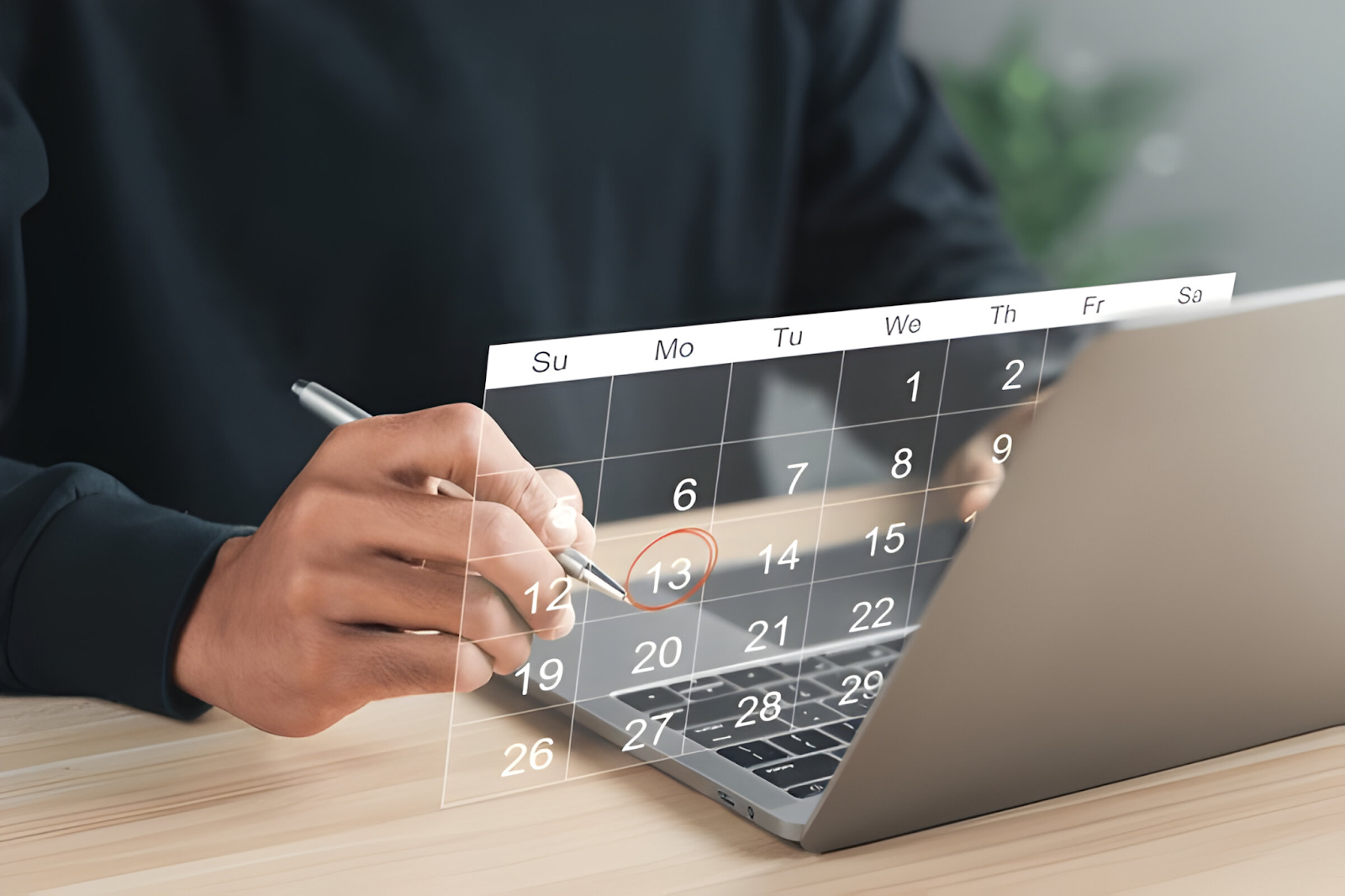 Person marking a date on a digital calendar, symbolizing the challenge of meeting client expectations and deadlines in accounting.