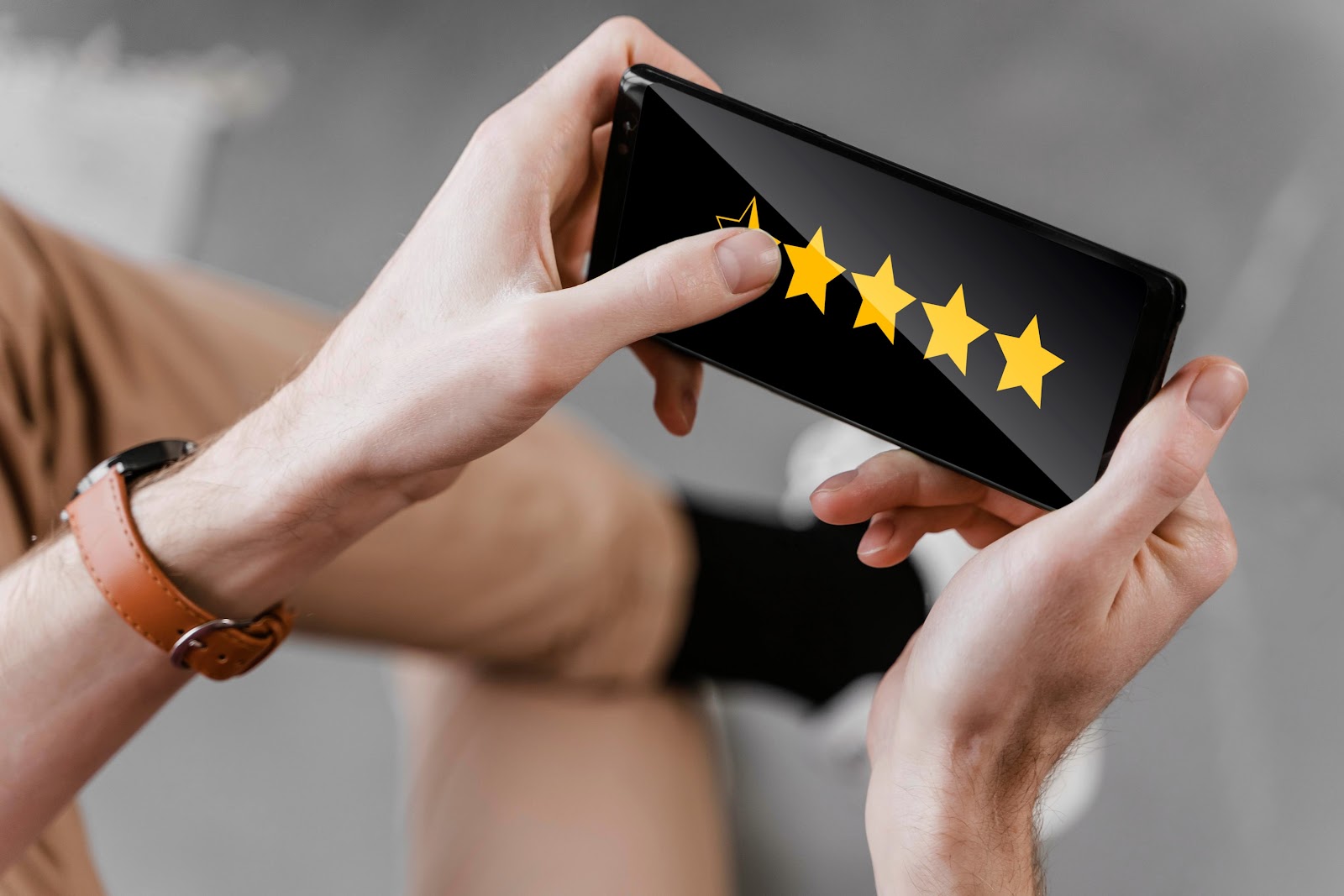 Mobile device showing a five-star rating