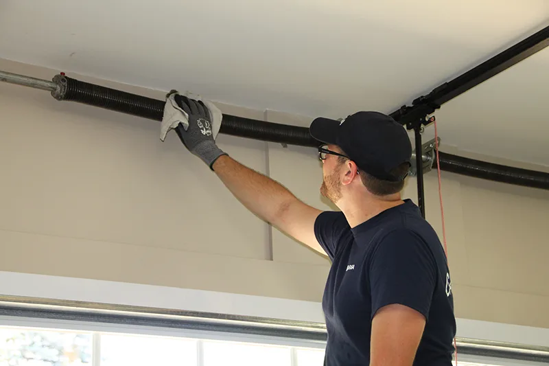 how to replace garage door spring