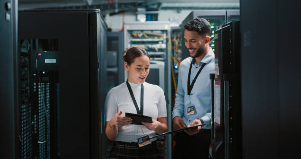 A man and woman discuss the best cloud system to use. 