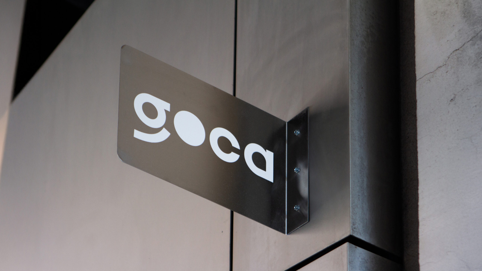 Image from the GOCA's Branding & Visual Identity: A Bridge Between Worlds article on Abduzeedo