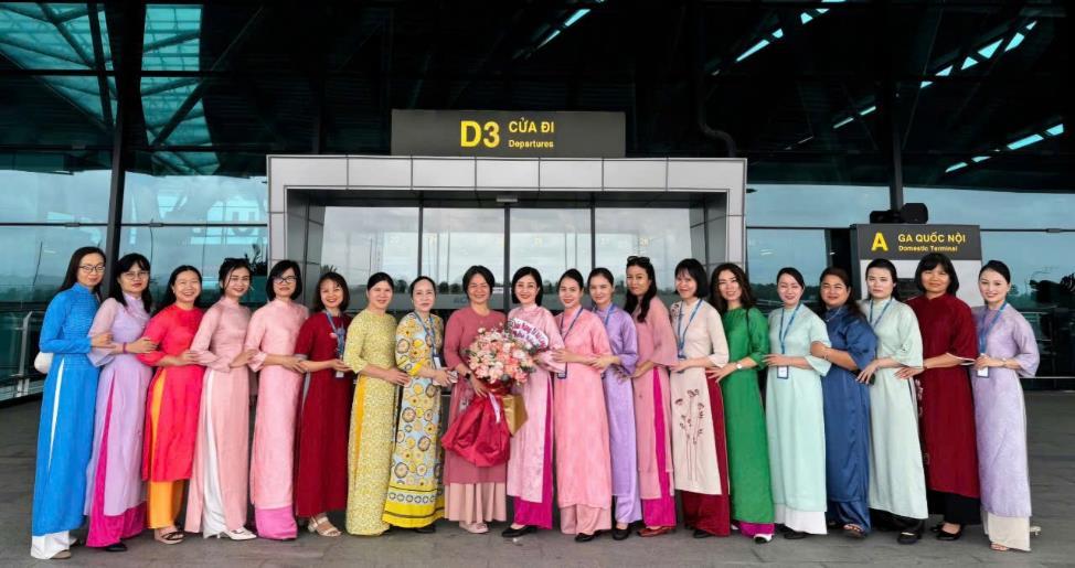 A group of women in colorful dressesDescription automatically generated