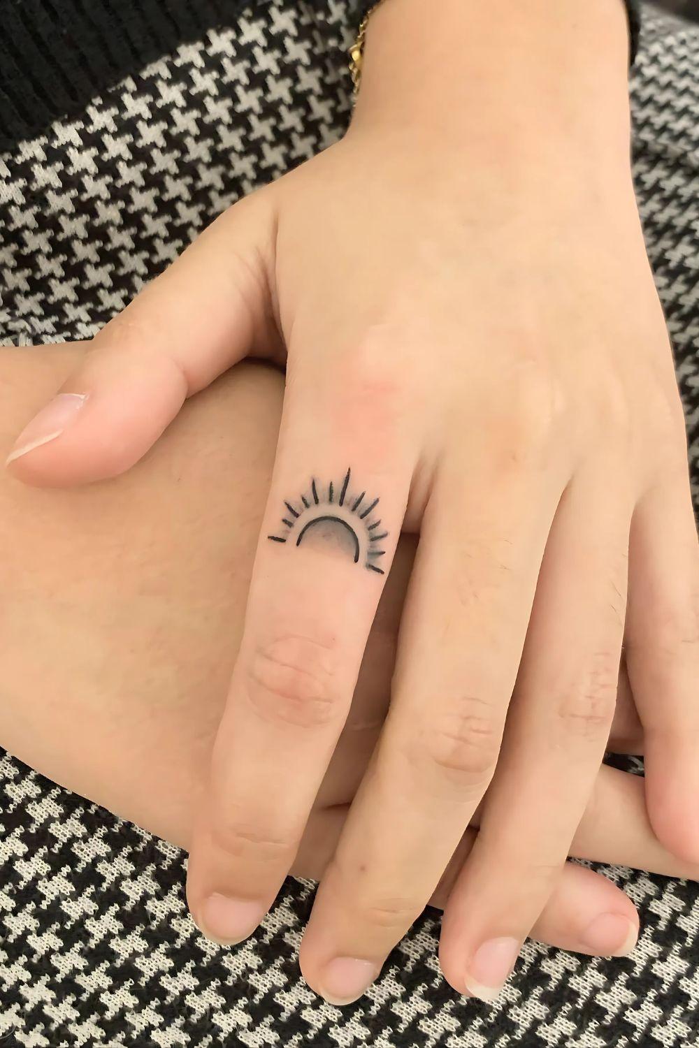 Sunrise of the Soul Finger Tattoo