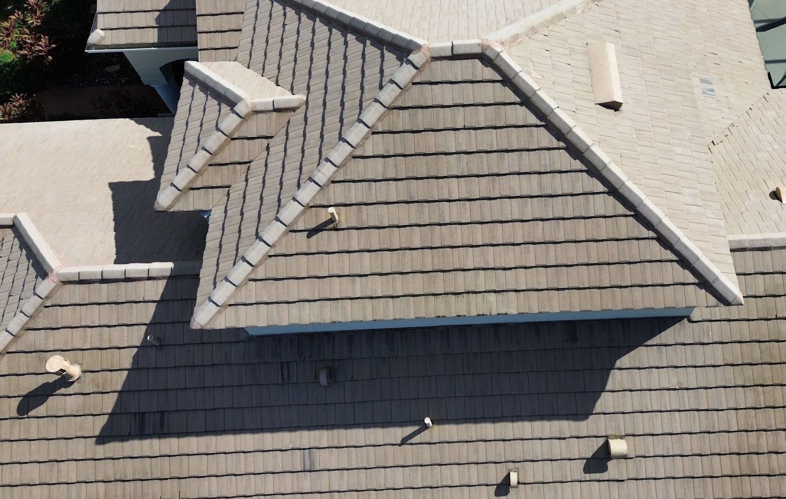 Close-up of tile roofing materials used in roof installation, known for their durability and aesthetic appeal – part of what is roof installation.