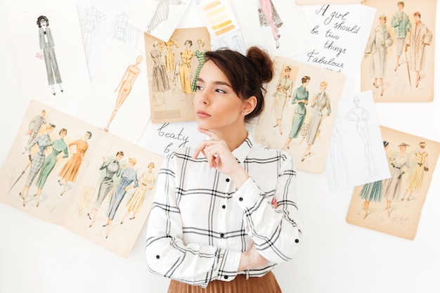 The Evolution of Fashion Designer Styles Through Decades