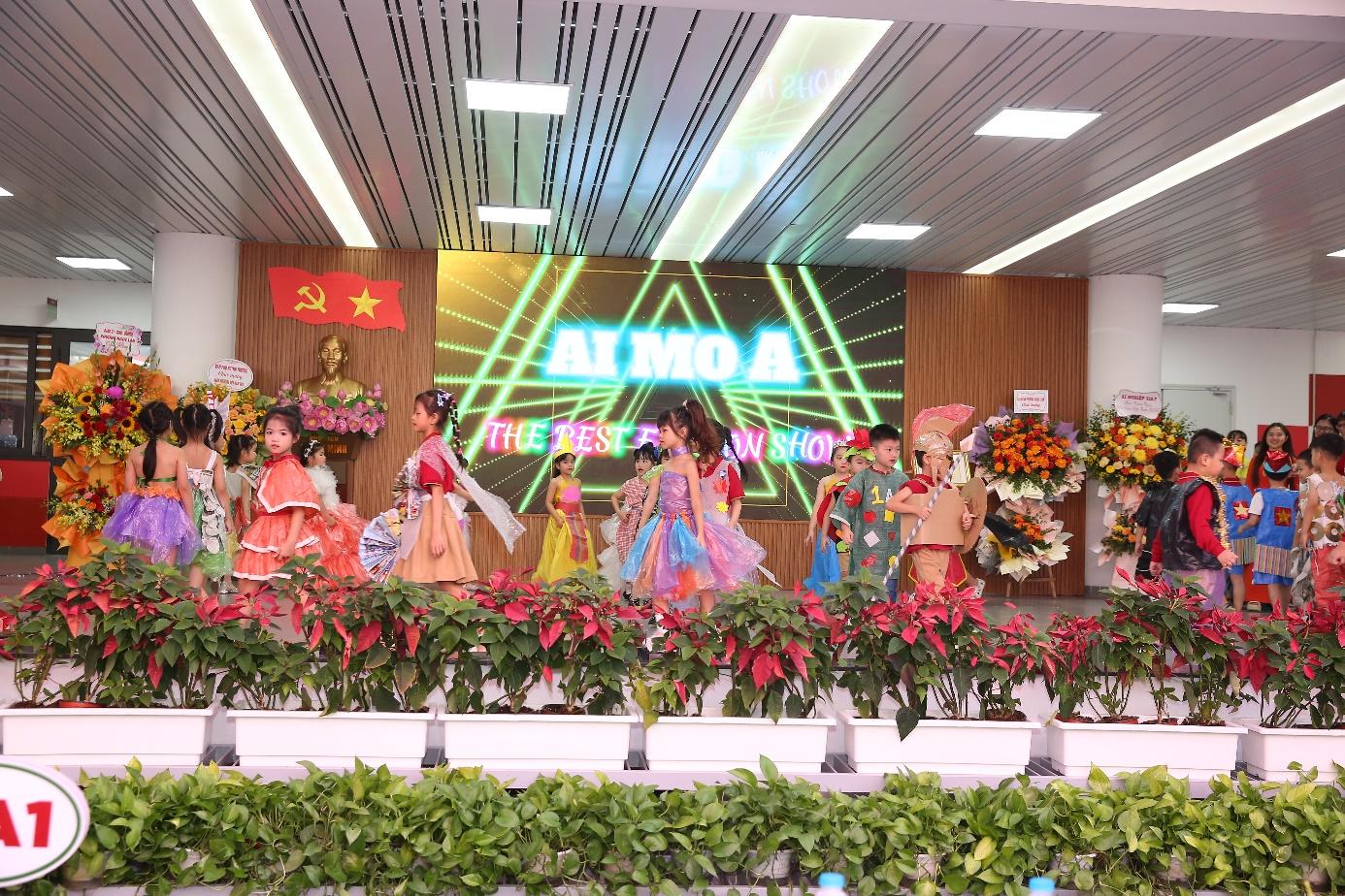 A group of women in colorful dresses on a stage

Description automatically generated