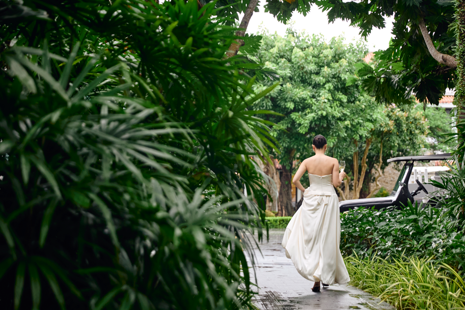 A person in a white dress walking down a path

AI-generated content may be incorrect.