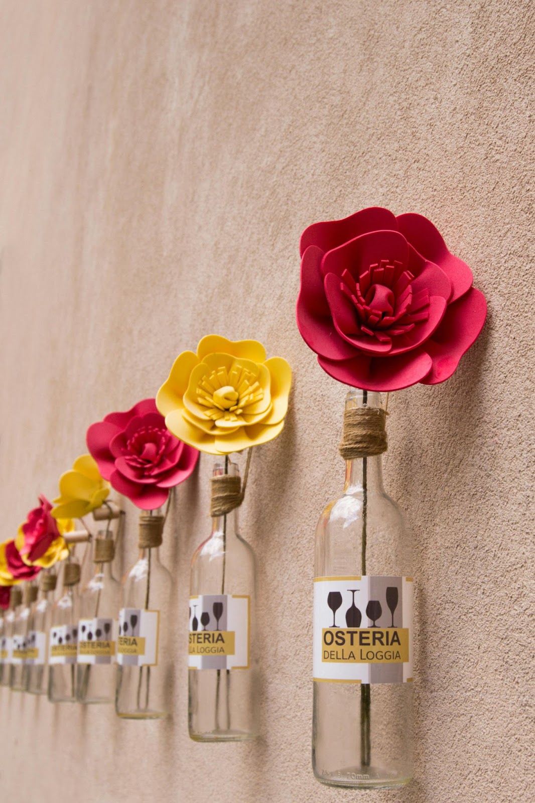 https://www.pexels.com/photo/artificial-flowers-in-glass-bottles-11919971/