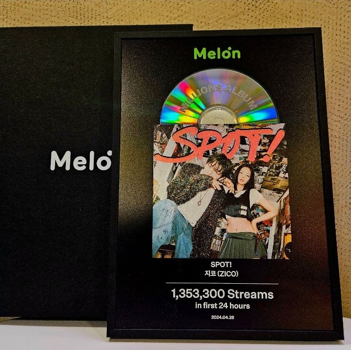 This contains an image of a cd with the name melon on it is sitting next to a book cover