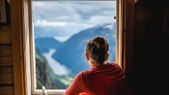 Woman Overlooking Fjord in Norway Through Window starts June 24, 2025 at 09:00PM
