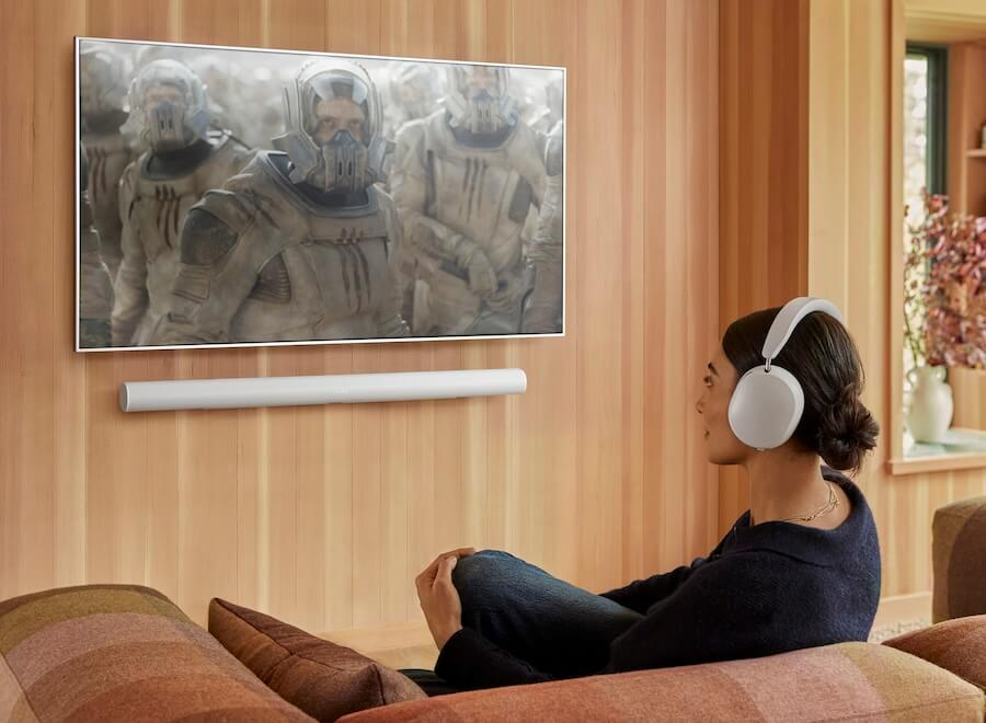 Sonos Arc Ultra soundbar with Sonos Ace headphones.