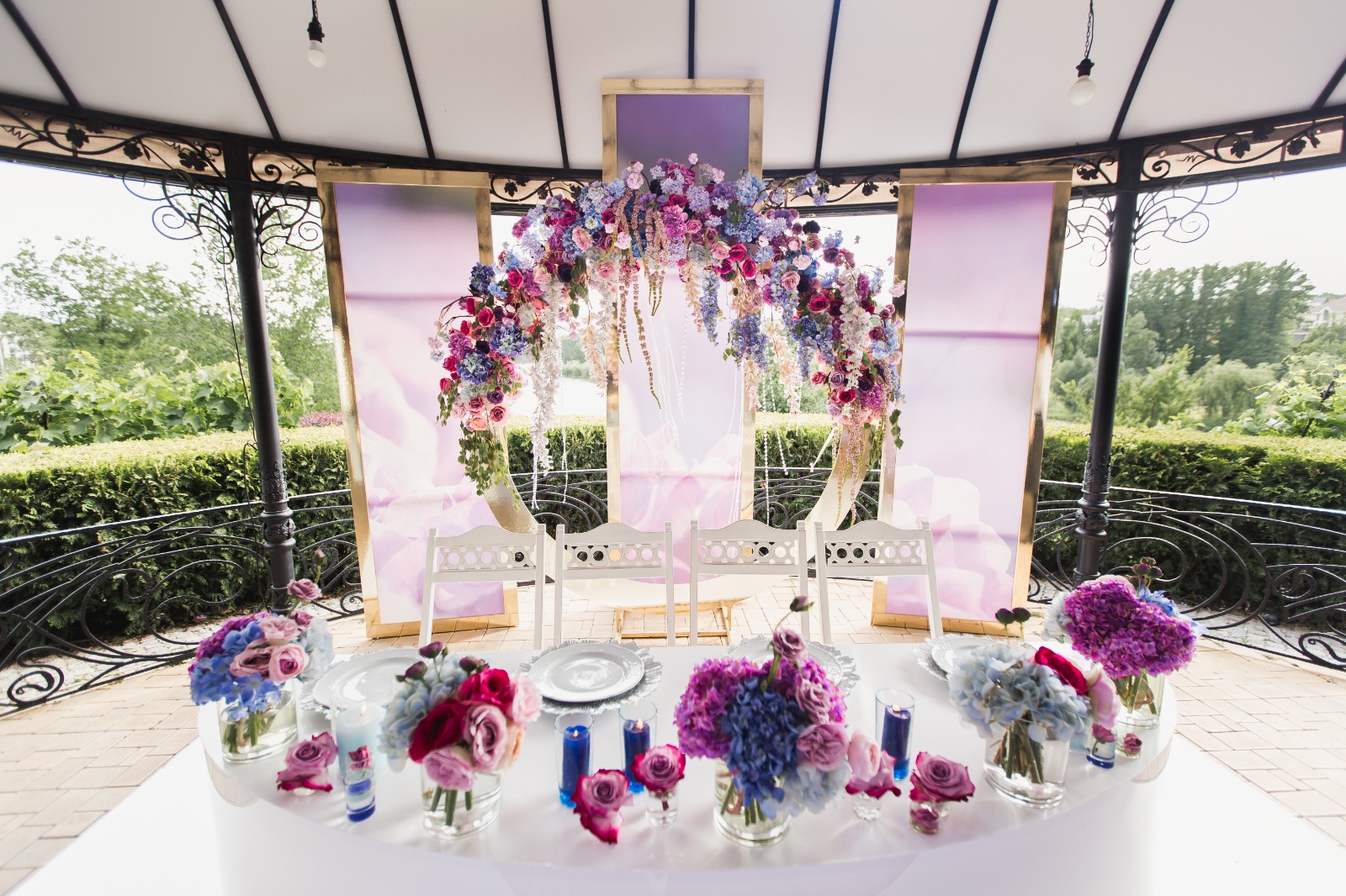 Chinoiserie Wedding Decor details including hand-painted screens and oriental motifs at an outdoor garden ceremony