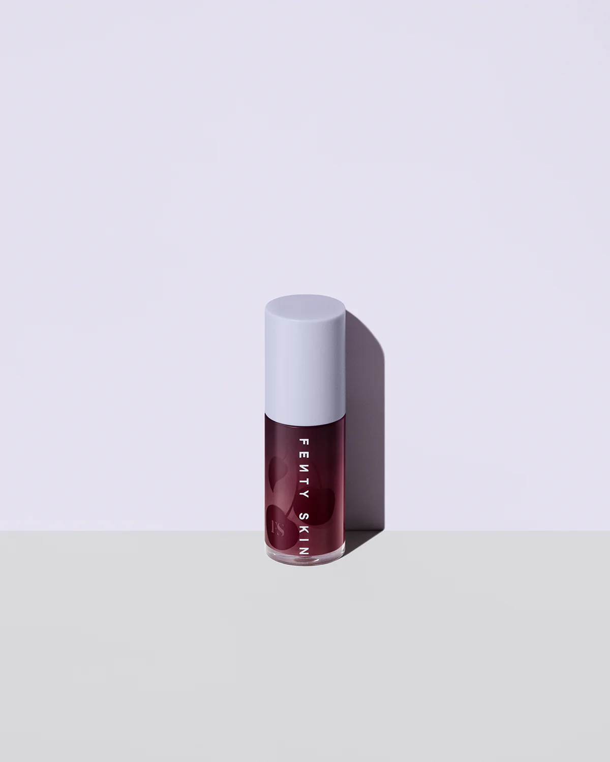 Treatz Hydrating + Strengthening Lip Oil de Fenty