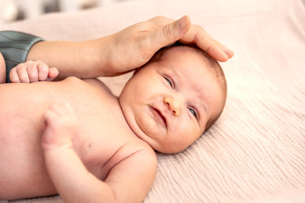 Newborn baby girl close-up