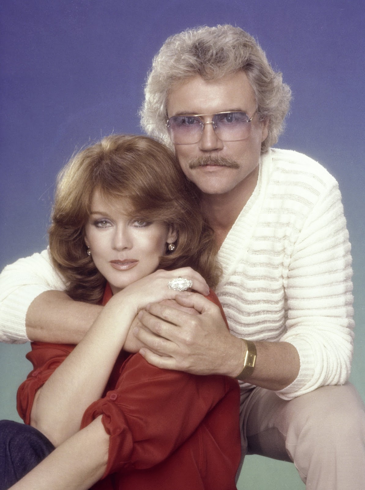 The singer and actress and husband Roger smith pose for a portrait in the 1980s | Source: Getty Images