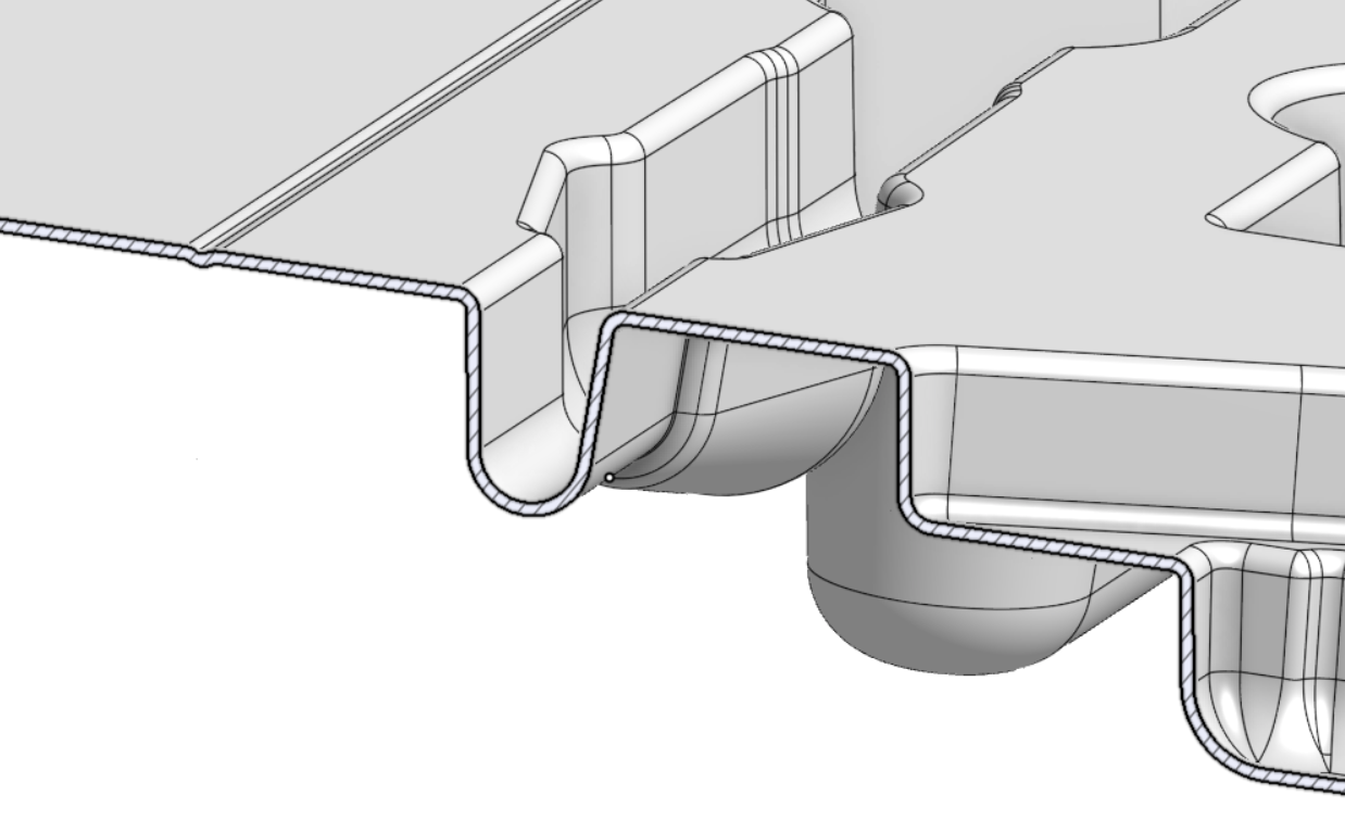 A close-up of a metal piece

Description automatically generated
