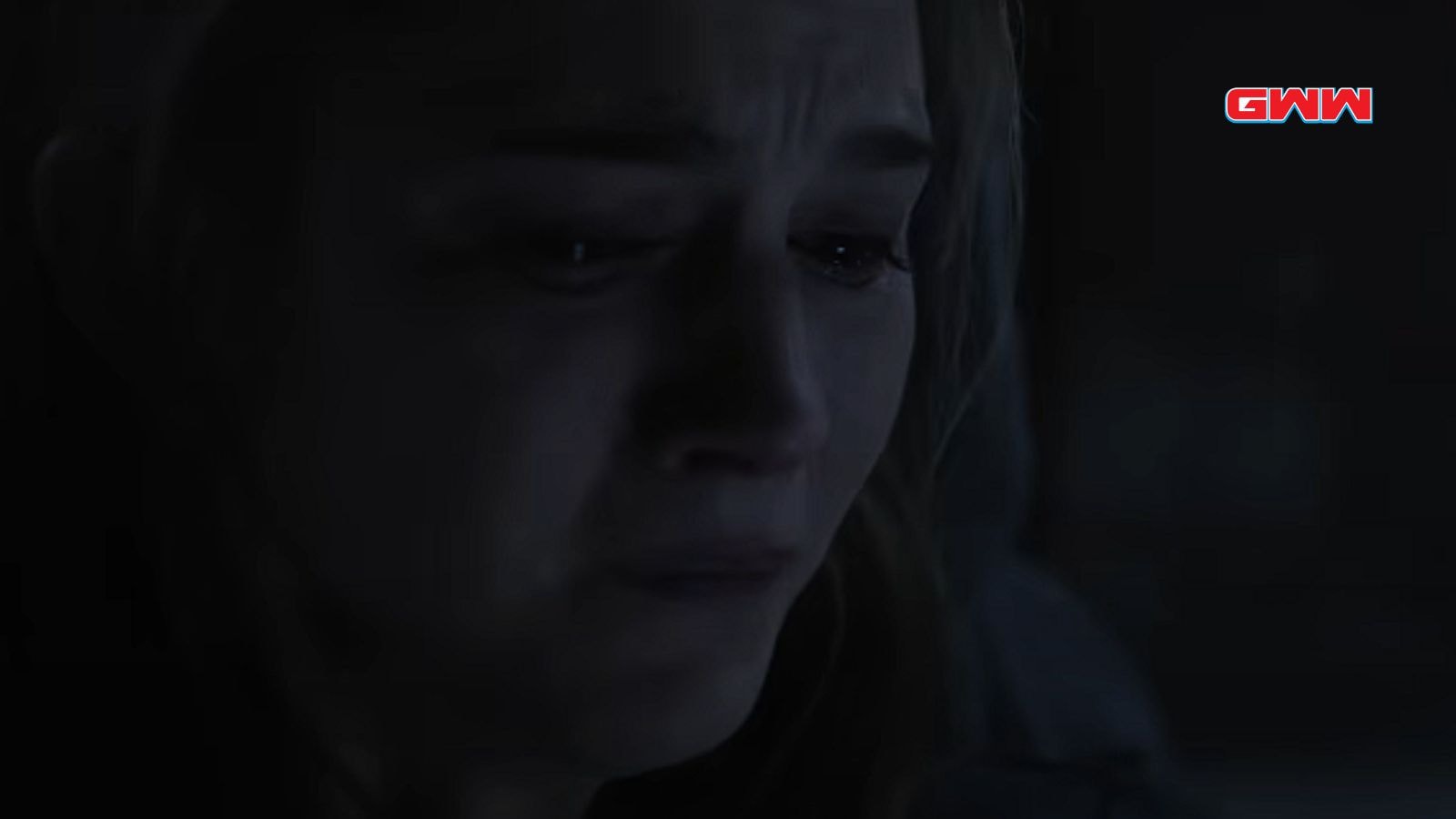 Chloe East crying in a dark and emotional moment.