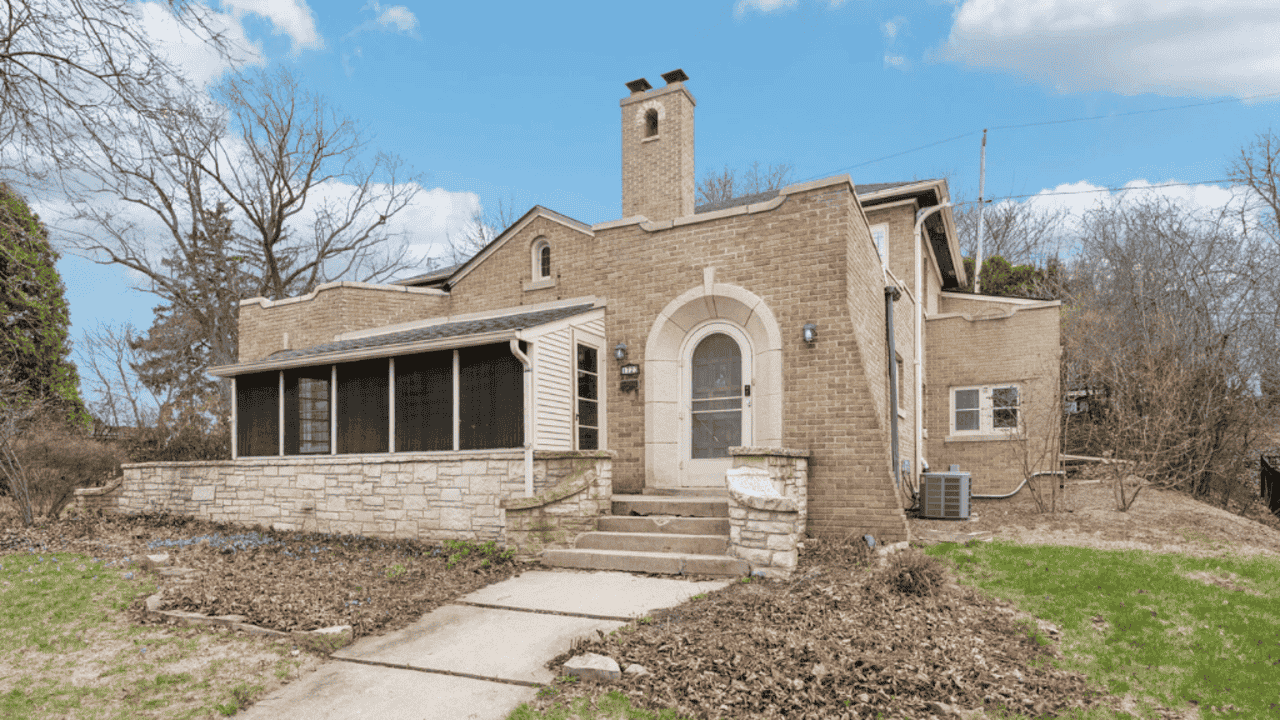 Tour This 3,766 Sq Ft Mediterranean Colonial in Wauwatosa, WI with Historic Charm and Courtyard Garden