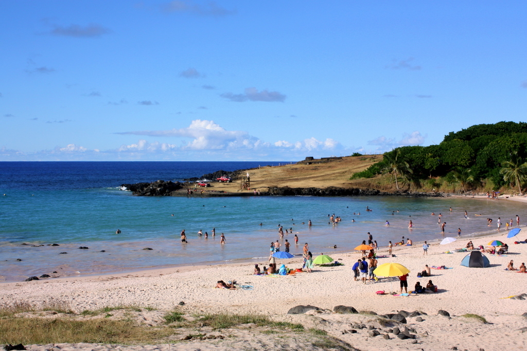 Beach with people enjoying.