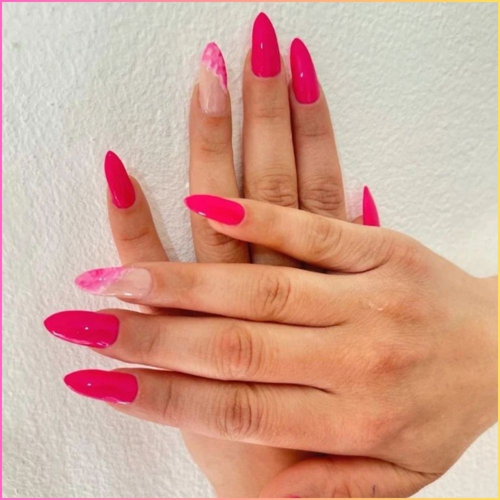 Close up of nails with simple pink nail designs having Hot Pink Nails