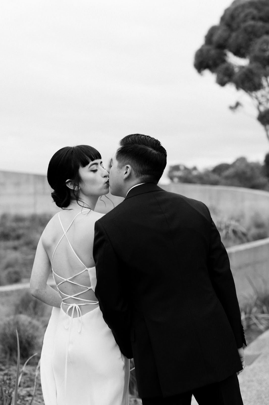 Couple kiss on a walk, Port Phillip Estate wedding, Australia, Lachlan Scallion, Really Good Weddings, Australia 