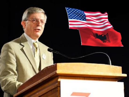 A person standing at a podium with a flag behind him

AI-generated content may be incorrect.