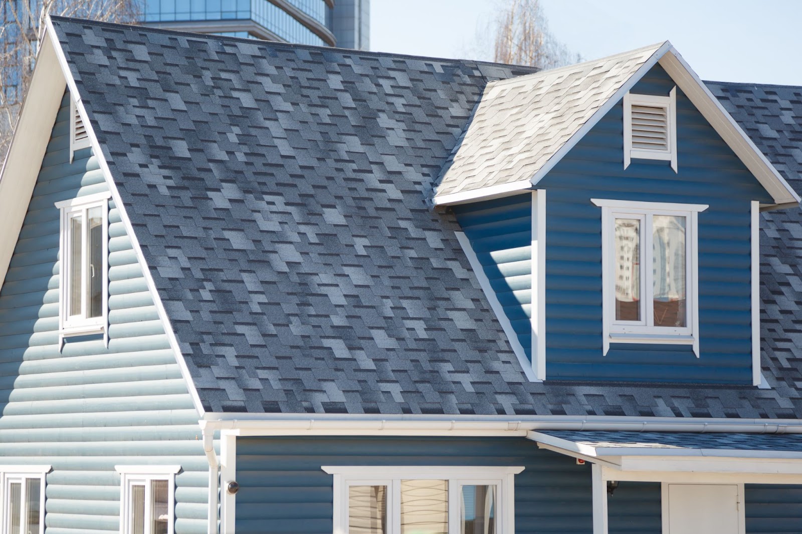 Side view of a home with siding.  