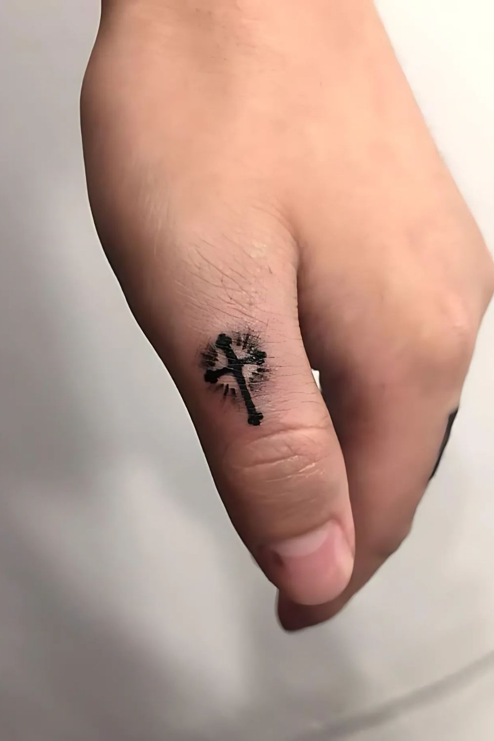 Simple Rosary Finger Tattoo