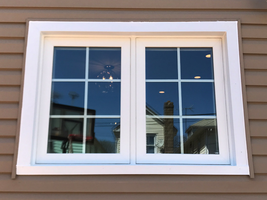 Vinyl double casement window replacement