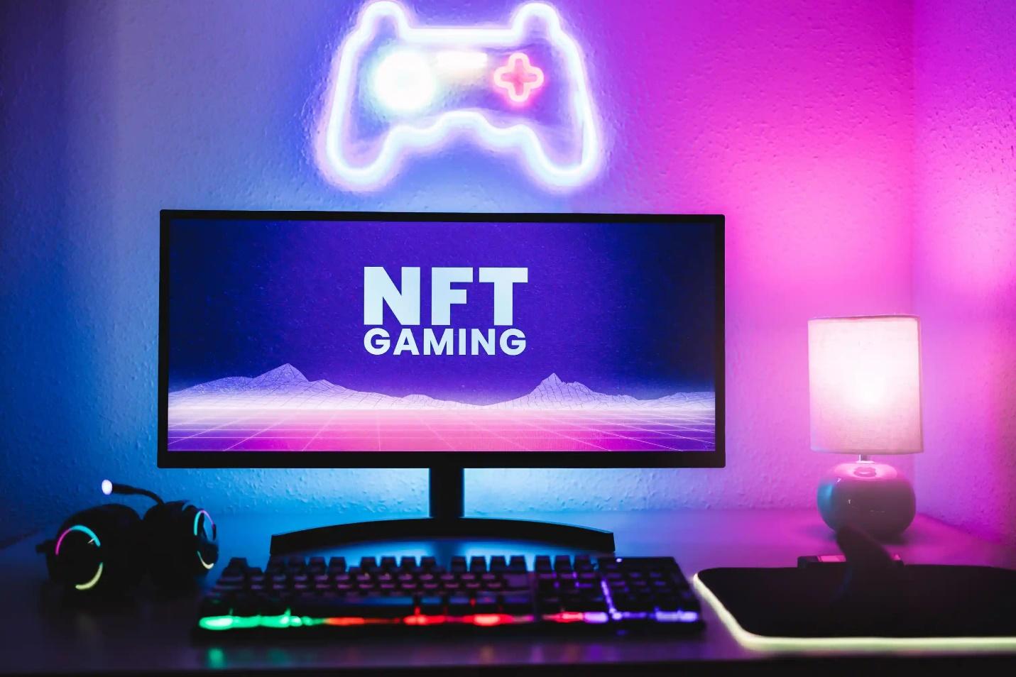 A simple yet high-end looking gaming system with the monitor showing “NFT Gaming”.