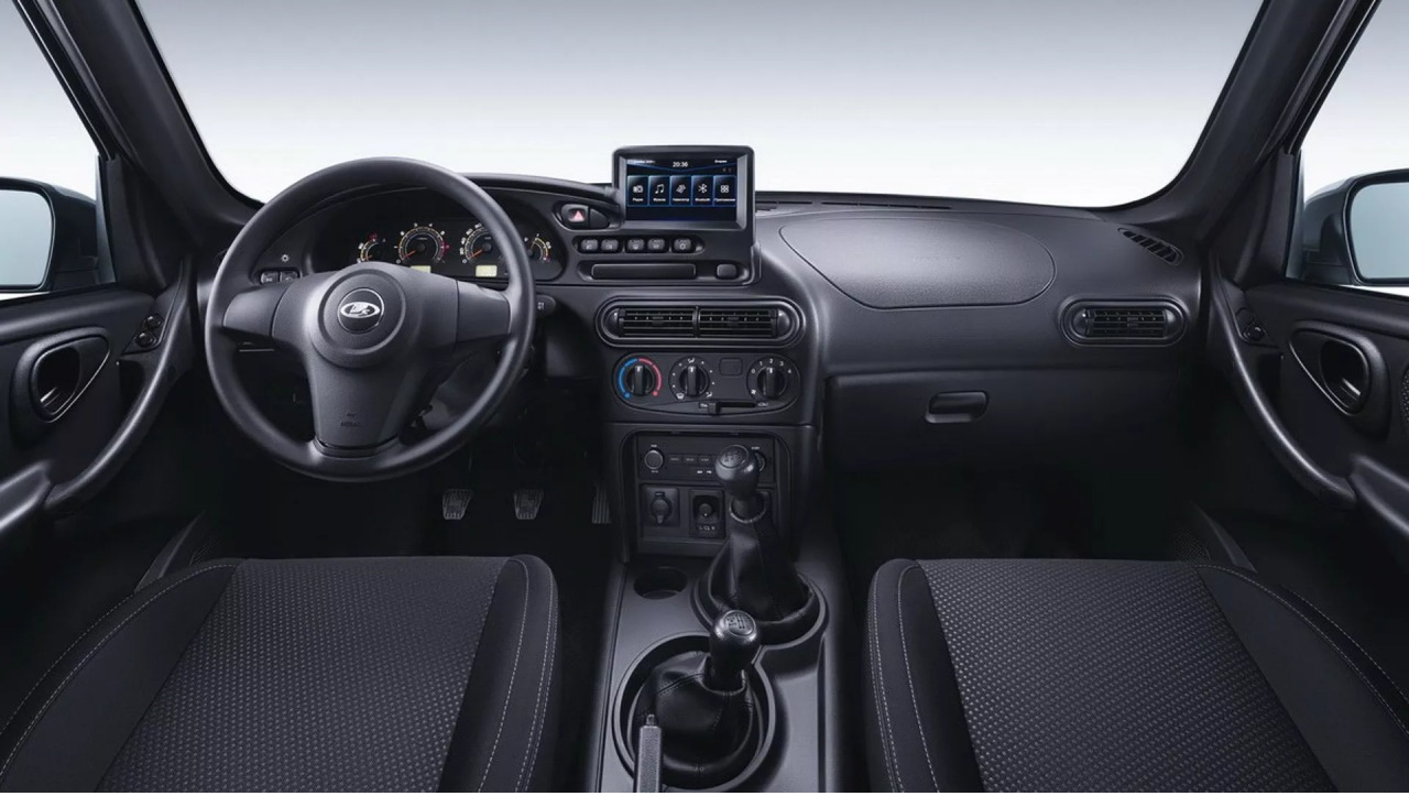 The 2025 Lada Niva Travel features a refreshed exterior and new engine with slight power gain, maintaining its efficiency and rugged off-road capability.