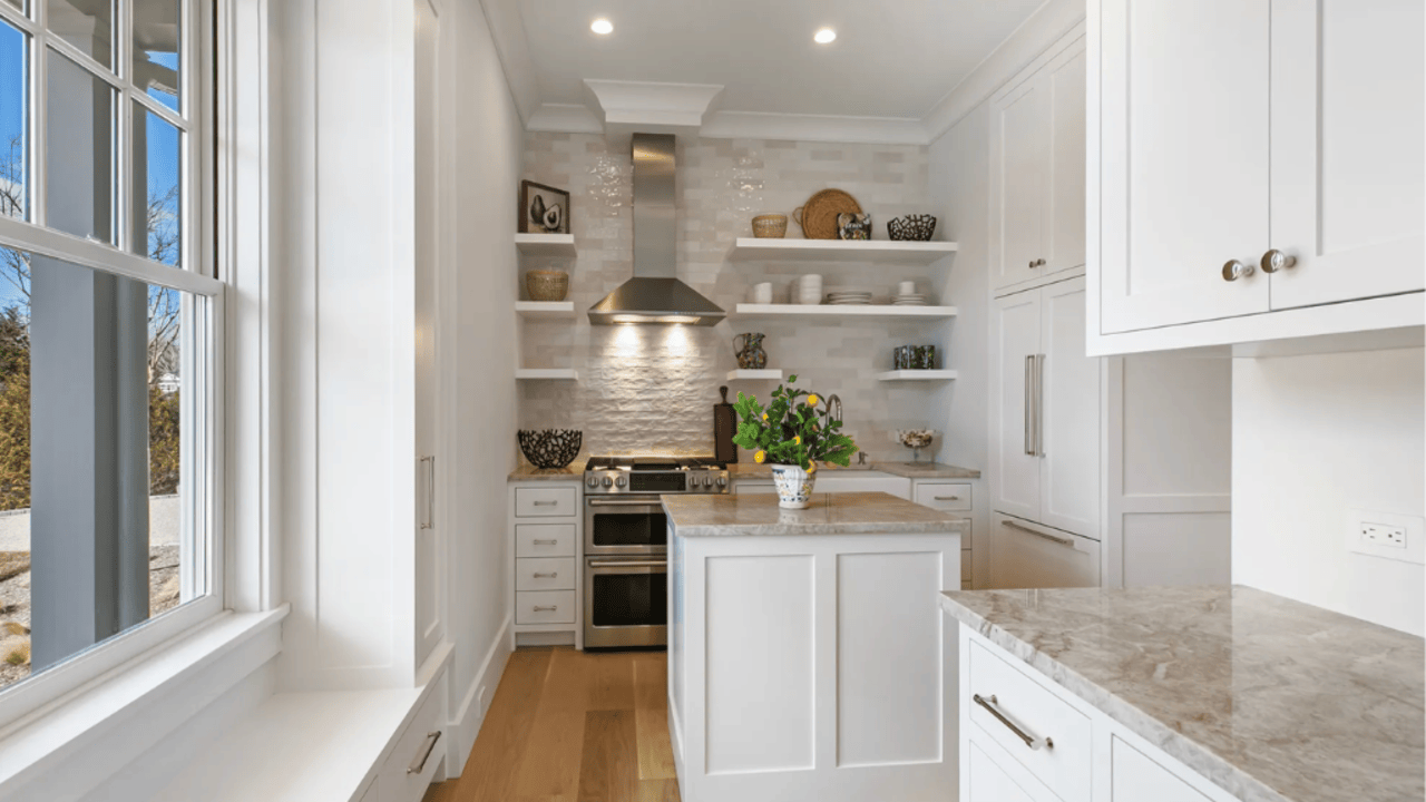 Tour This 8,094 Sq Ft Shingle-Style Waterfront Estate in Quogue, NY with Floating Staircase and 300-Bottle Wine Cellar