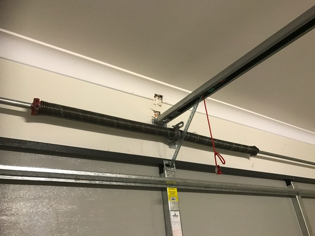 how to replace garage door spring