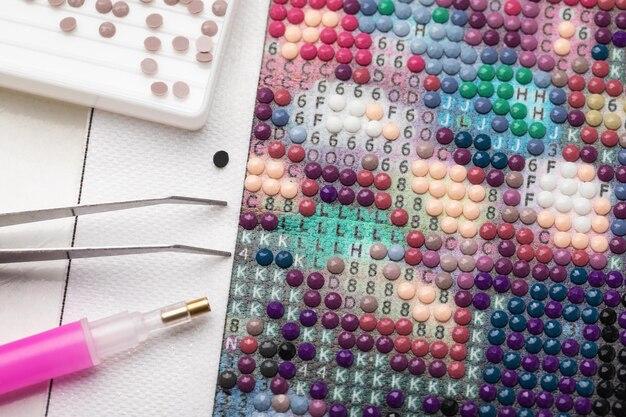 tools-assembling-picture-from-small-parts-by-numbers-top-view-part-mosaic_437105-3769.jpg