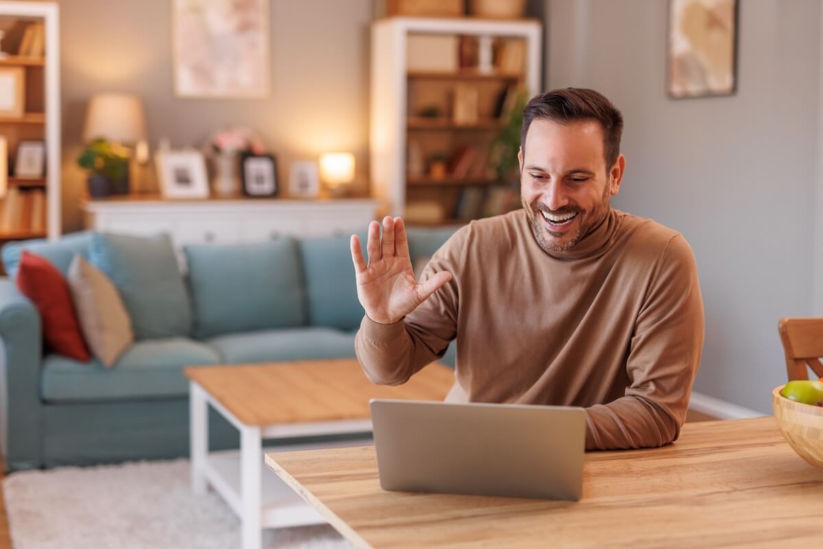 Employee using his laptop for a video call