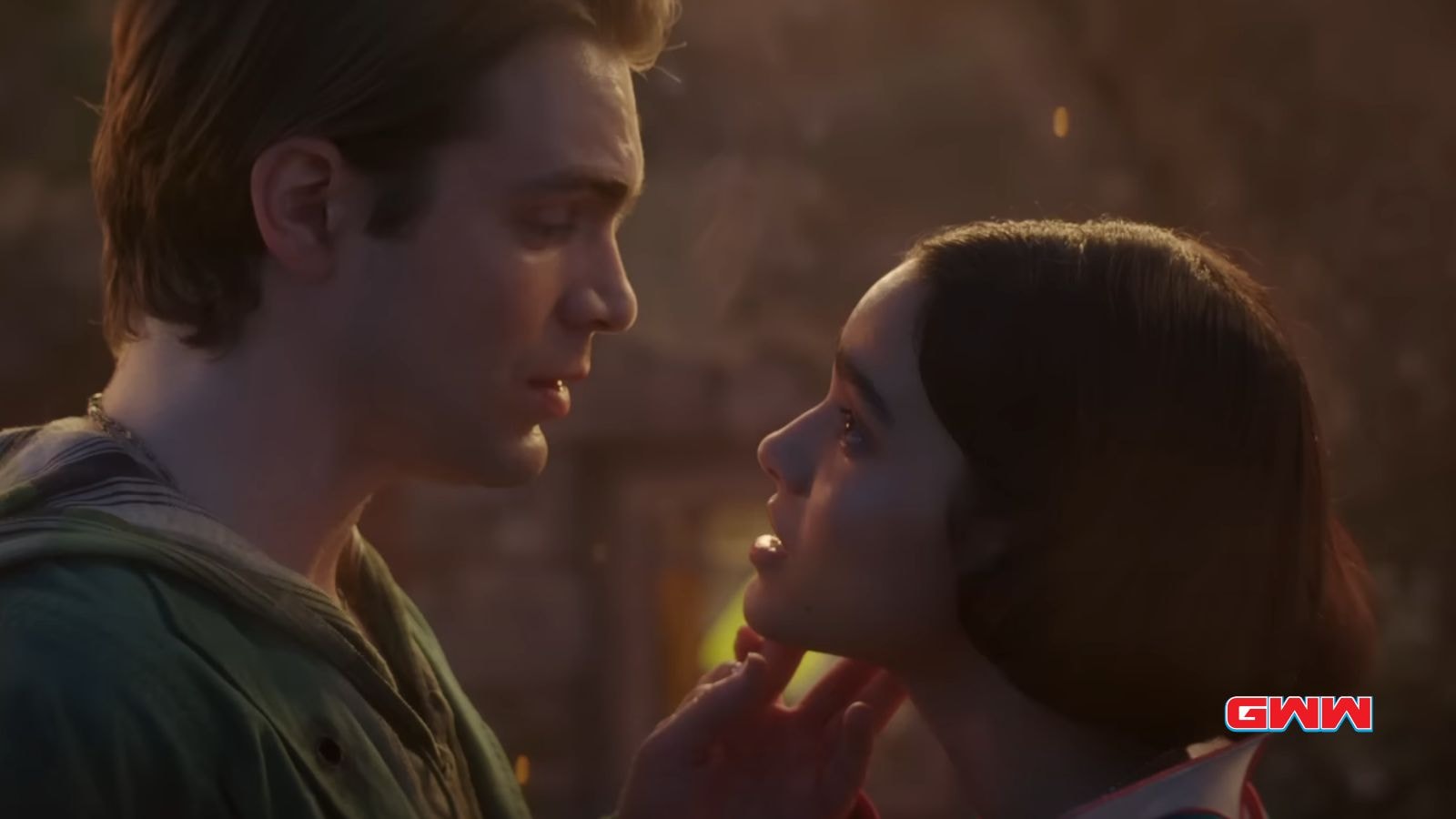 Snow White and the Prince share a tender moment, gazing into each other’s eyes.