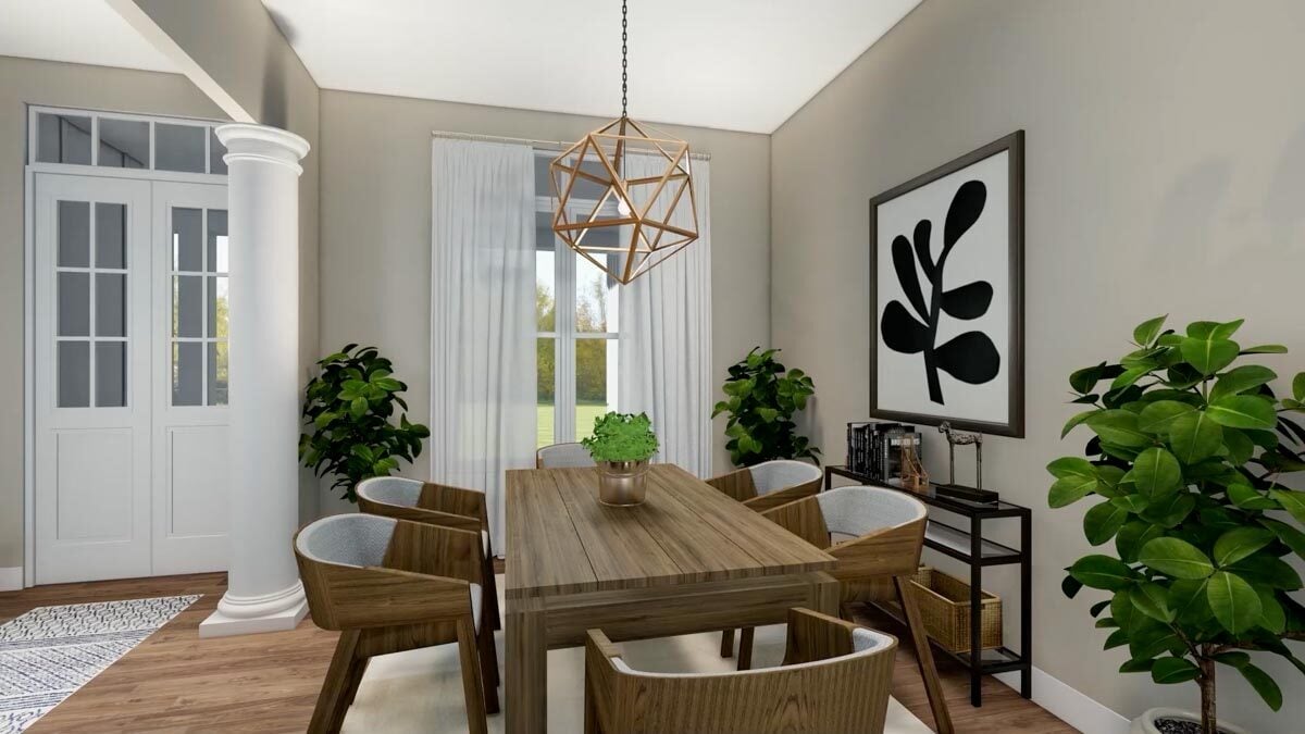 An iron console table adorned with a framed artwork completes the dining room.