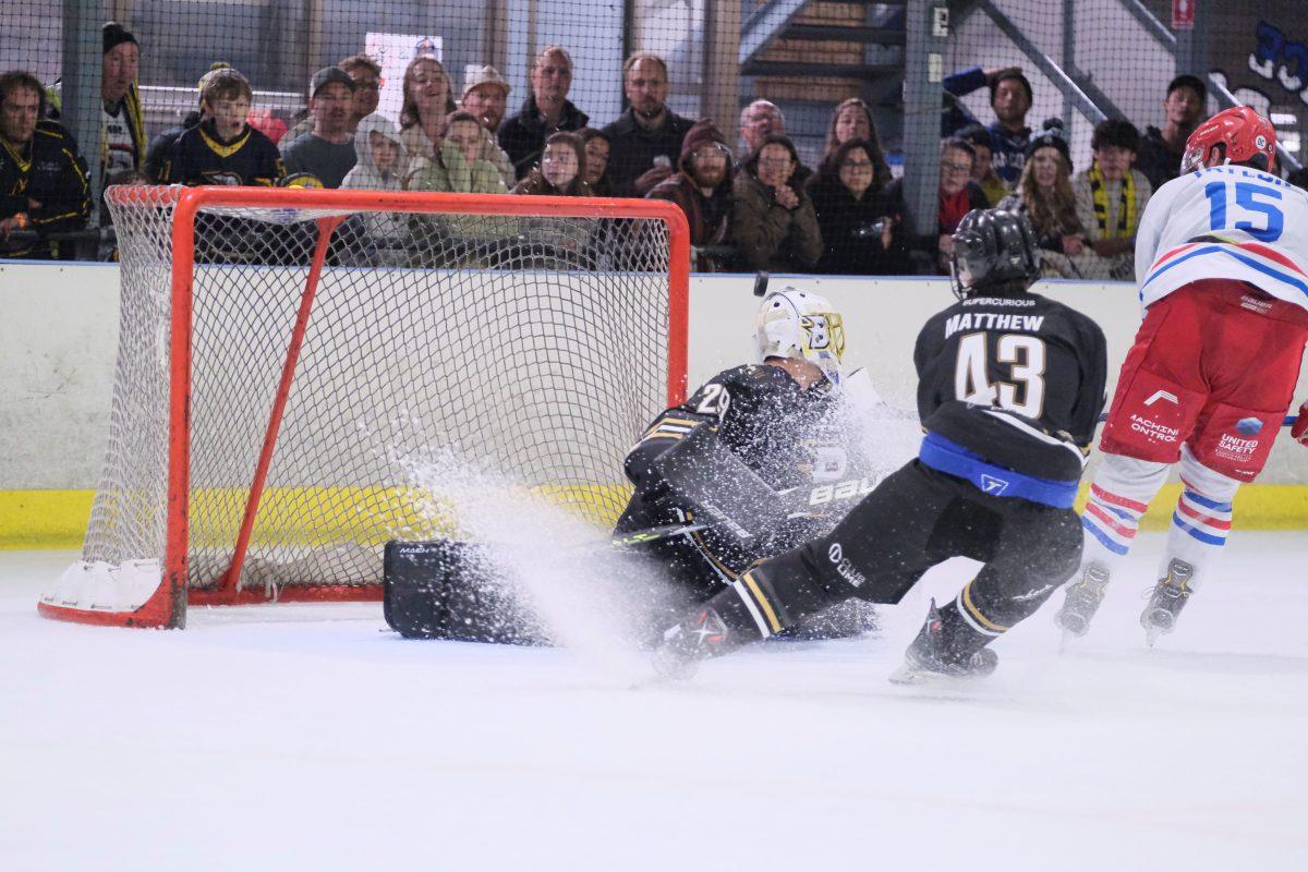 ice hockey players in a rink