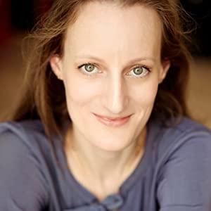 A close-up of a person smiling

Description automatically generated
