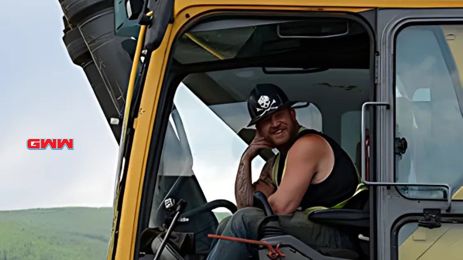 Rick Ness from Gold Rush operating machinery while taking a break